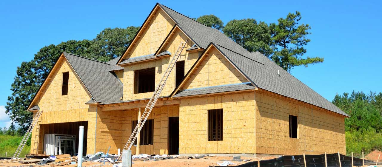 House under construction with wooden framing